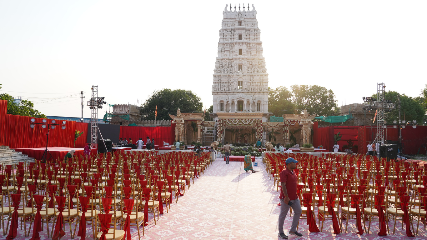 Temple wedding seating arranged in front of the decorated stage